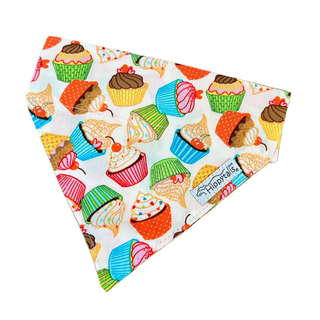 Colourful cupcake patterned bandana with 'Hippytails' branding on a white background